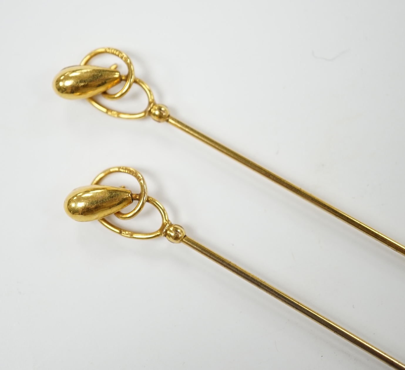 A pair of George V 9ct gold hat pins by Charles Horner, 31.1cm, 4.8 grams. Condition - good